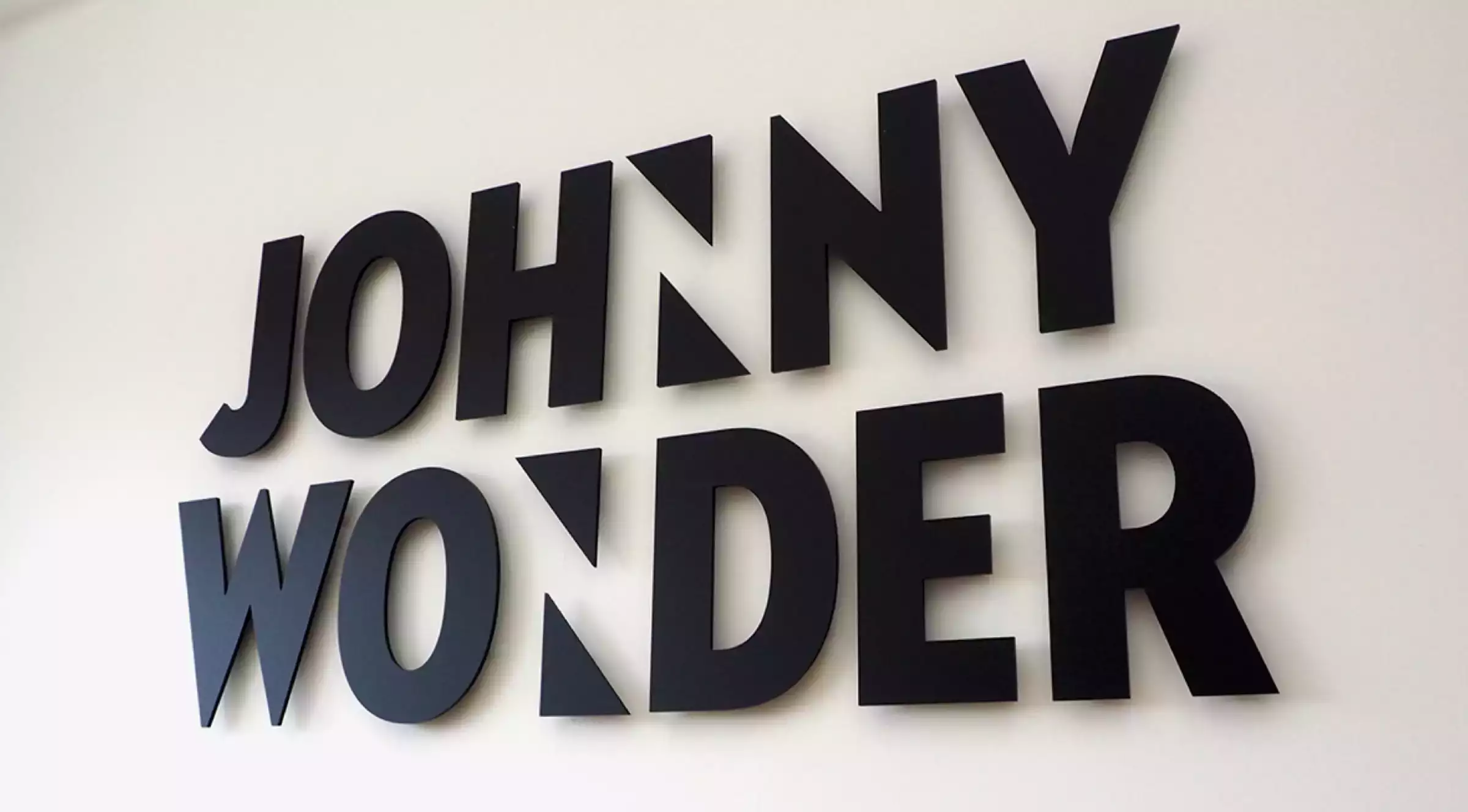 Huisstijl Johnny Wonder logo